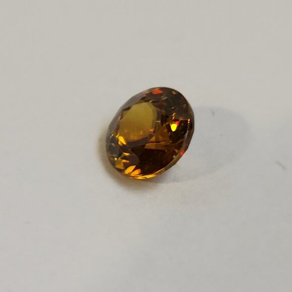 Sphene 7.18mm x 6.88mm x 4.30mm Oval 1.47ct Loose Gemstone - Picture 12 of 16